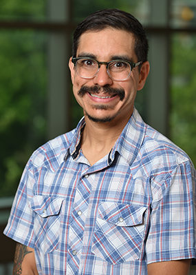 Headshot of Danny Caballero, Lappan-Phillips Associate Professor of physics education.