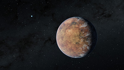 Newly discovered Earth-sized planet TOI-700 e orbits within the habitable zone of its star in this illustration. Its Earth-sized sibling, TOI-700 d, can be seen in the distance. 