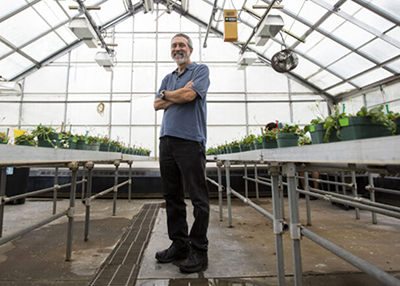 Jeff Conner in a greenhouse