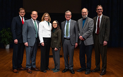 A group photo of key MSU collaborators in the $5 million MSU Researach Foundation grant. They are (left to right): Phil Zecher (Chief Investment Officer, MSU), Dave Washburn (Executive Director, MSU Research Foundation*), Teresa K. Woodruff (Interim President, MSU*), Melissa Woo (Executive Vice President for Administration, MSU*), Doug Gage (Vice President for Research and Innovation, MSU*), Doug Buhler (Assistant Vice President for Research and Innovation, MSU), Eric Hegg (NatSci Associate Dean, Budget, Planning, Research and Administration, MSU). 