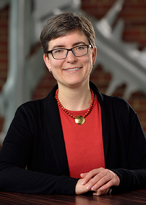 A headshot of Julia Ganz,assistant professor in the NatSci Department of Integrative Biology and a faculty member in MSU’s Neuroscience Program, taken in the atrium of MSU's Molecular Plant Sciences Building.