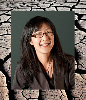 Headshot of Sue Rhee with parched, cracked soil as a backdrop.