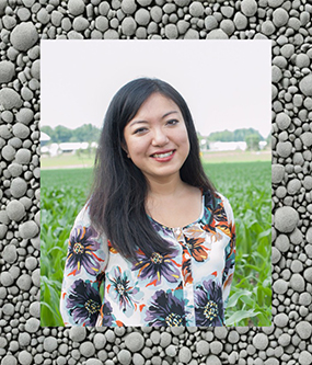 Hadeshot of Felicia Wu with greey pebbles as a backdrop.