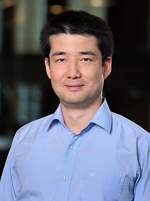 Headshot of Yang Yang in a light blue shirt.