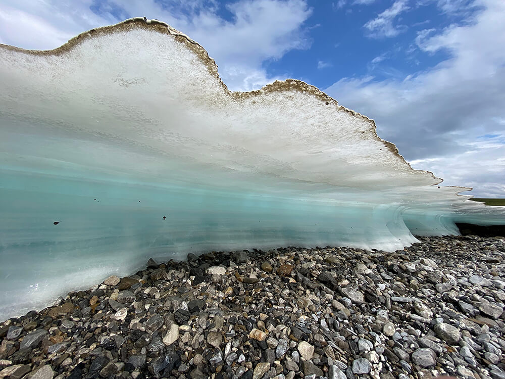 An aufeis — a seasonal mass of layered ice that forms when ground or stream water is exposed to freezing temperatures during the long