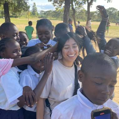 Faith Gupta with a group of students in Kenya