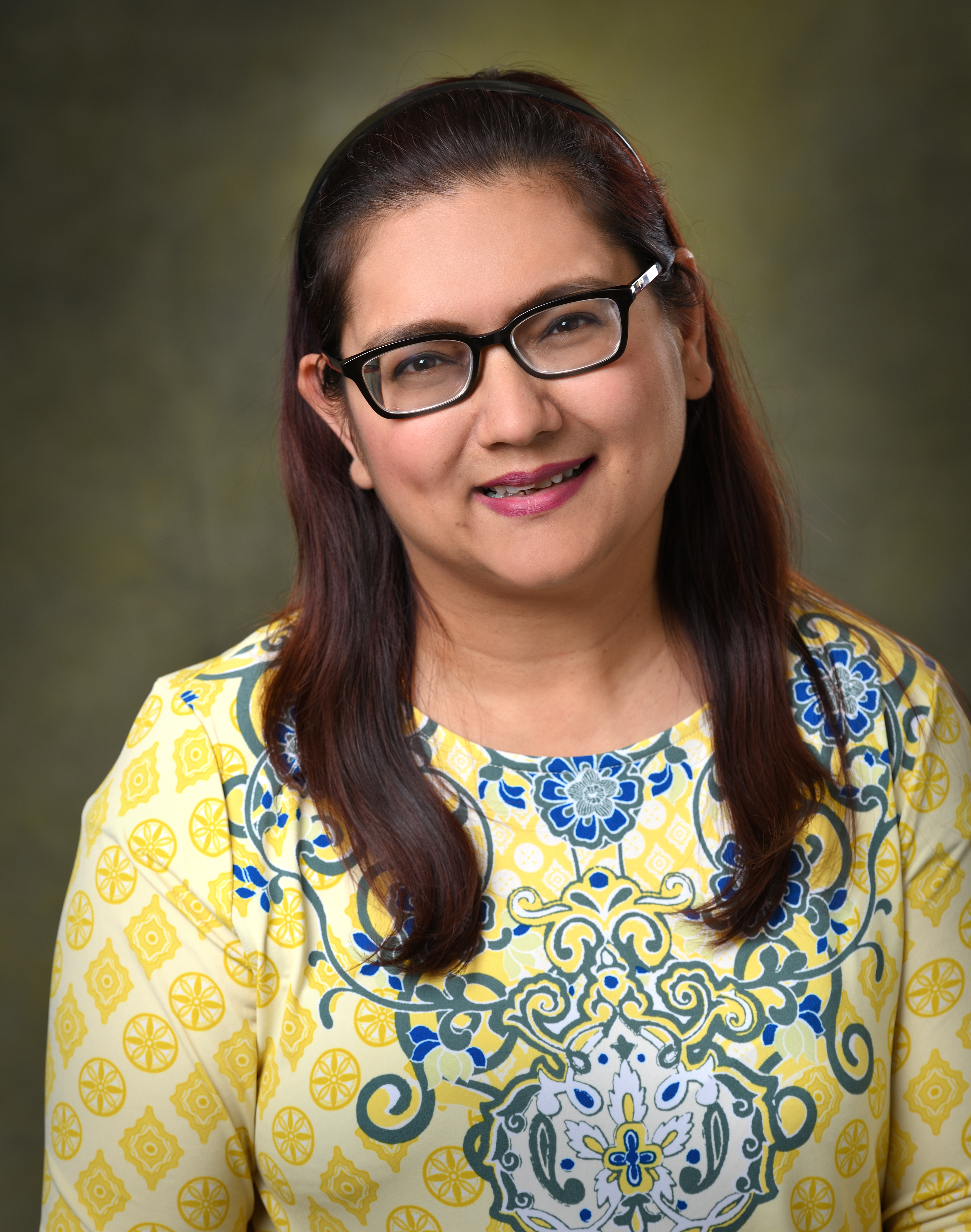 head and shoulders photo of Dola Pathak