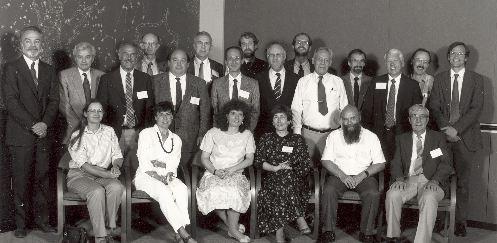 A balck and white photo of a group of people from 1990.