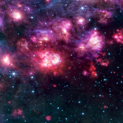 Image of Space with glowing pink clouds