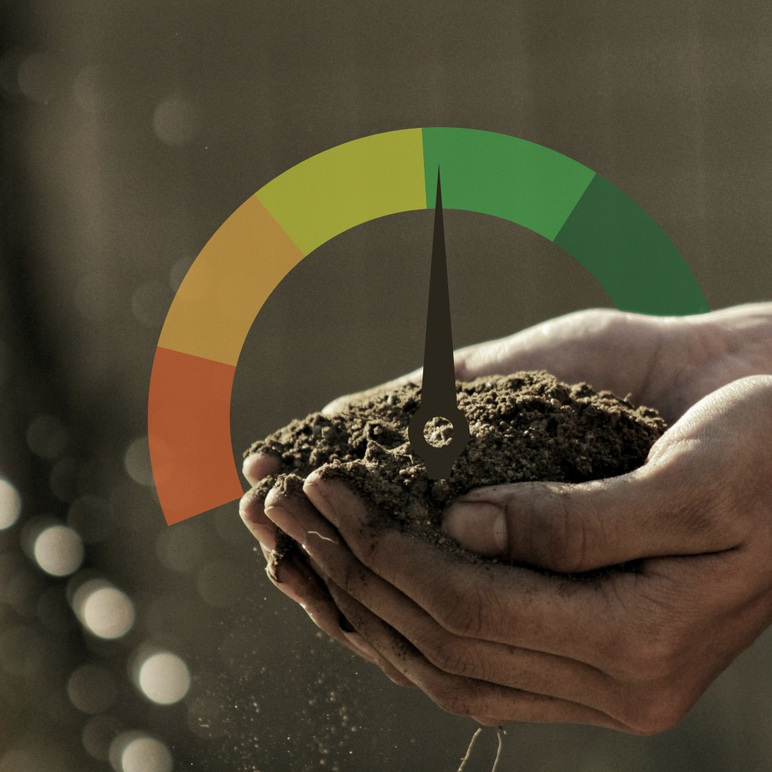 Composite image of hands holding a pile of soil with a gauge overlaid in the background.
