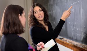 Image of Elise Zipkin at the chalk board