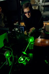 Image of Marcos Dantus with lasers