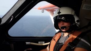 Image of Allison Sussman in a plane.