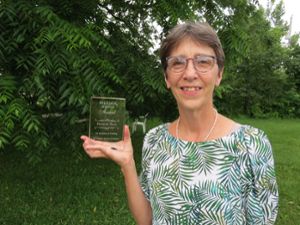 Frances Trail poses with her William Weston award