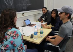 Image of studens working in an EMP-Cubed classroom.