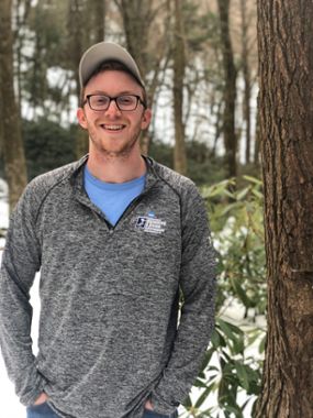 Image of Jeff Doser standing in a forest